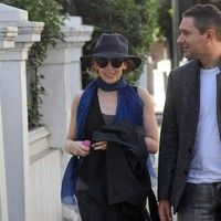 Kylie Minogue sporting a hat and sunglasses photos